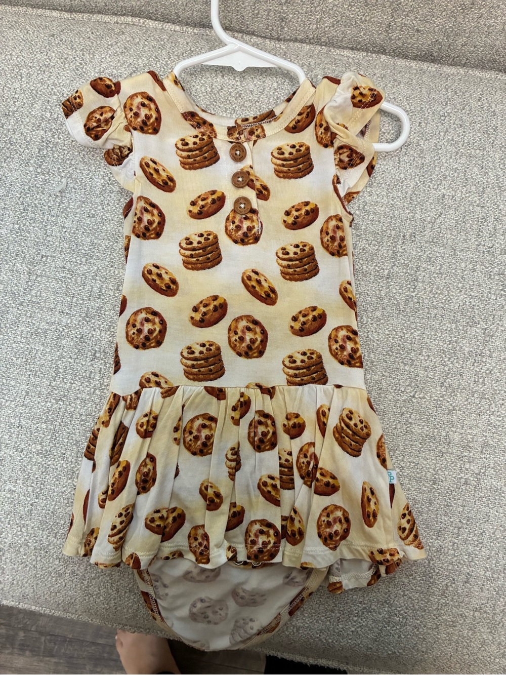 Posh Peanut Cream Cookie Print Ruffle One-Piece Bodysuit